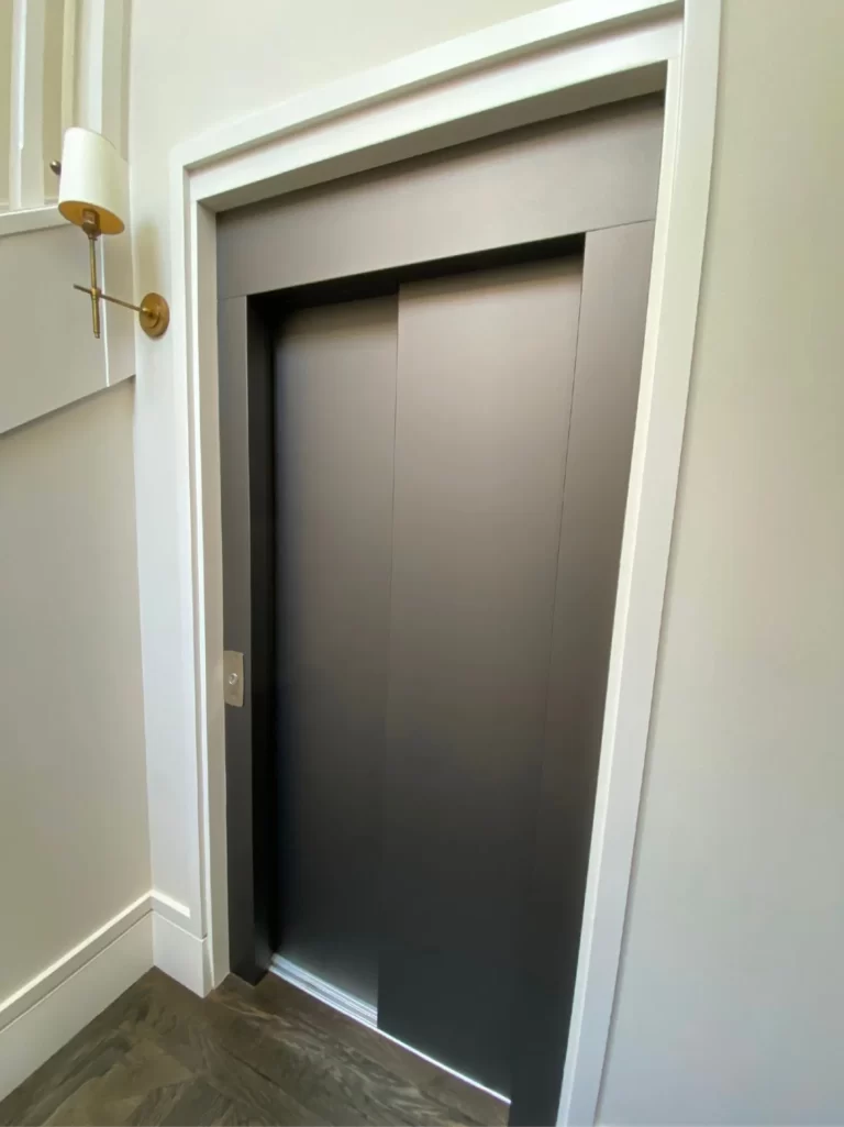 An elevator wrapped in a architectural Vinyl